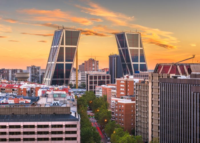 Madrid, Spain financial district skyline at dusk.