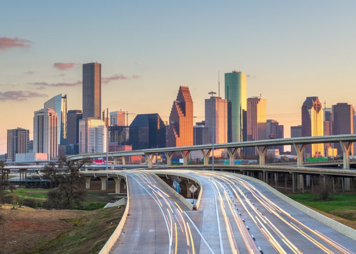 Houston, Texas, USA downtown skyline over the highways at dusk.